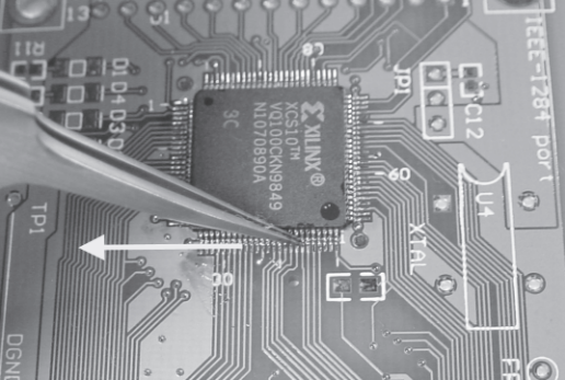 Figure B-5: Checking solder joints by stroking pins