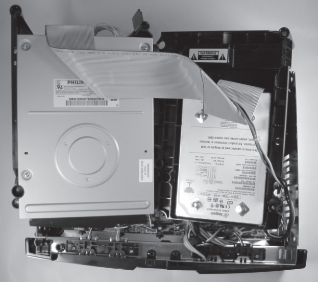 Figure 3-1: Position the disk drives so that the front edge of the motherboard is exposed.