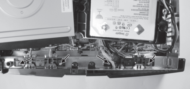 Figure 3-2: Retaining screws on the front panel assembly.