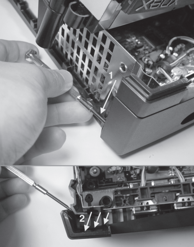 Figure 3-4: Loosen the edge friction locks with a flathead screwdriver.