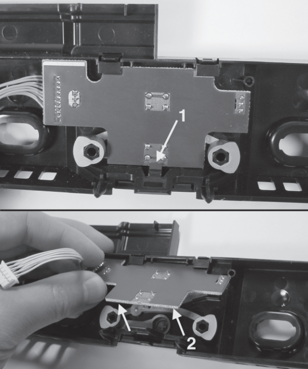 Figure 3-6: Lift the printed circuit assembly out of the front panel.