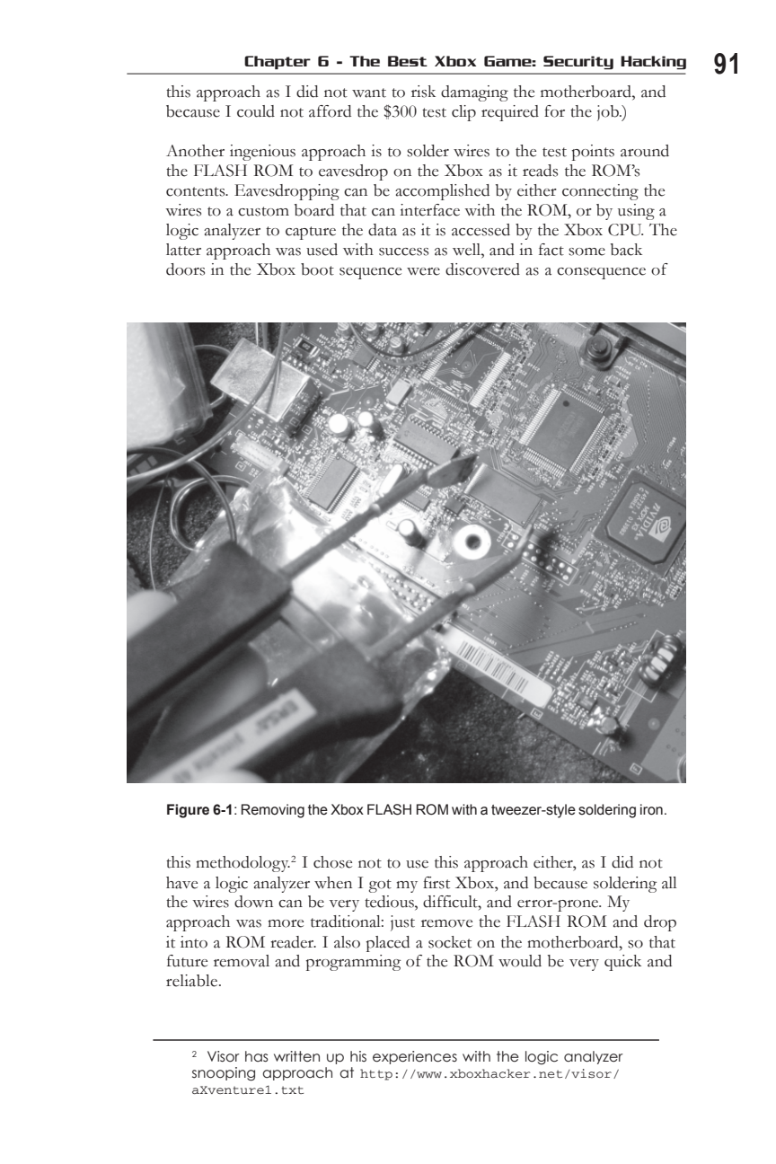 Figure 6-1: Removing the Xbox FLASH ROM with a tweezer-style soldering iron.